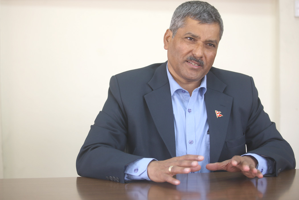 गभर्नर एम अधिकारी अर्थात् महाप्रसाद अधिकारीबारे छानविन गर्न संसदमा माग